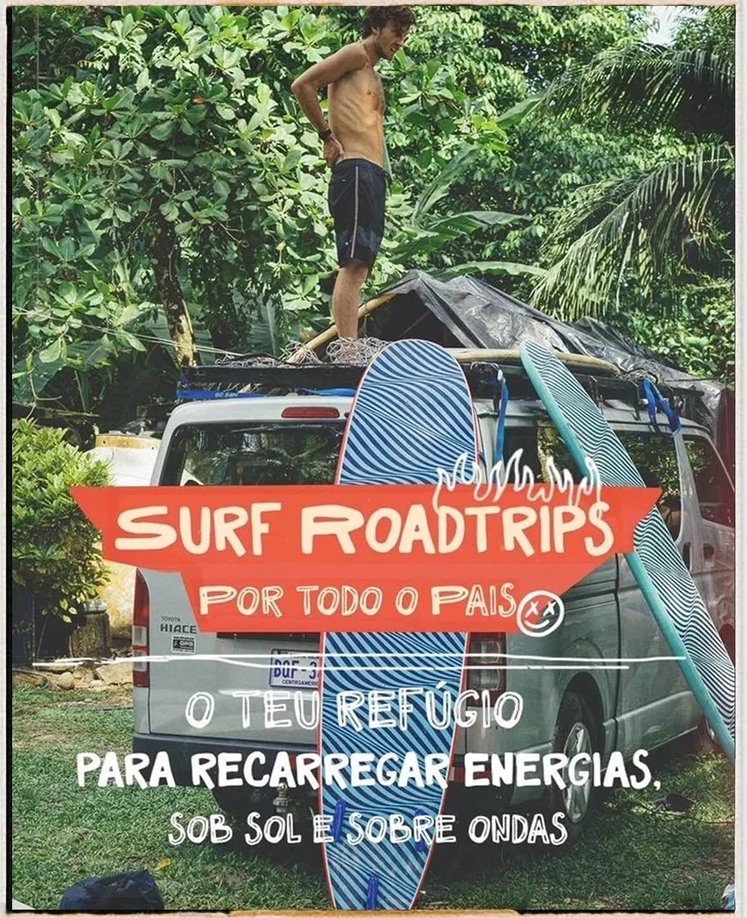 A shirtless young man standing on top of a van, surrounded by lush green tropical foliage, with two surfboards attached to the back of the van, and a sign promoting surfing trips for all countries and the importance of the surfboard as a space for re